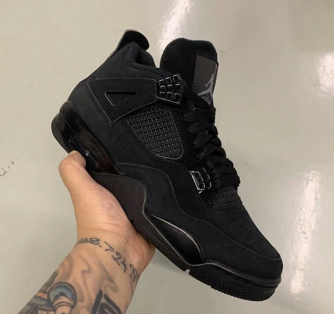 Air Jordan 4 Retro ‘Black Cat’ photo review