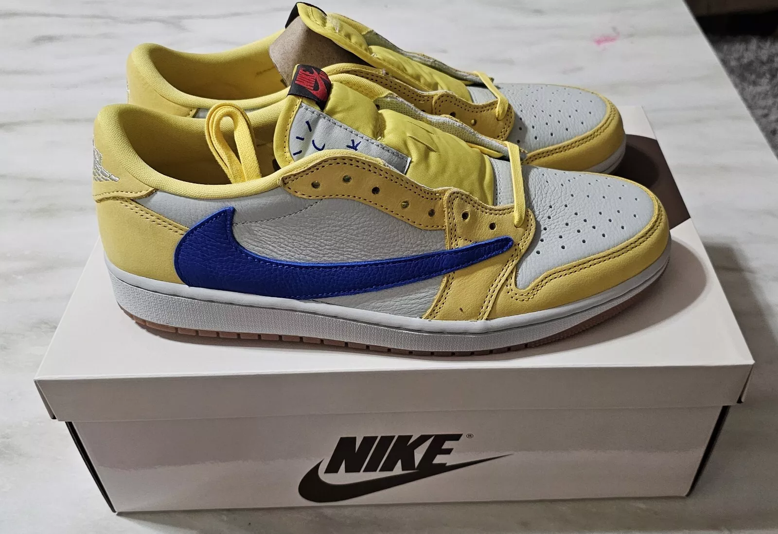 Air Jordan 1 Retro Low OG SP x Travis Scott ‘Canary’ photo review